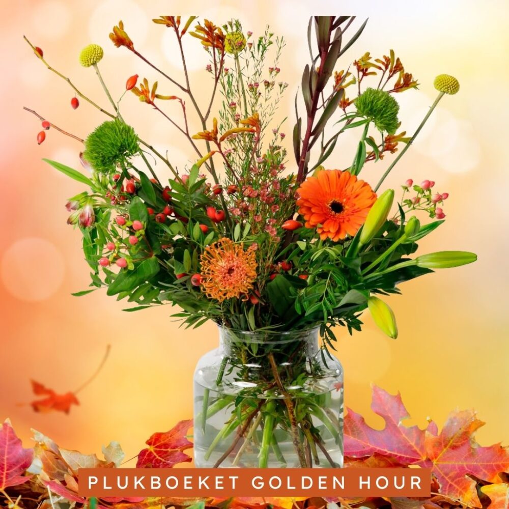 Boeket Golden Hour met oranje en groene seizoensbloemen